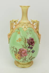 Royal Worcester for Tiffany & Co Double Handled Vase: Royal Worcester for Tiffany & Co Double Handled VaseRoyal Worcester for Tiffany & Co Double Handled Vase # 1539, floral decorated with a green ground. Used condition 9 1/2" tall x 5" diameter