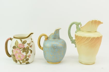 Group of Three Royal Worcester Gilt Decorated Porcelain Pitchers