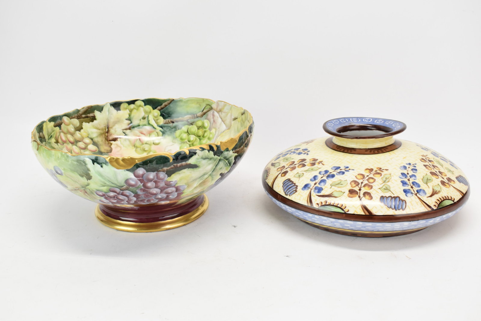T & V Limoges Floral Decorated Center Piece: T & V Limoges Floral Decorated Center Piece T & V Limoges Floral Decorated Center Piece. Together with a T &V Limoges grape decorated center bowl that measures 5 3/4" tall x 13" diameter. Used conditi