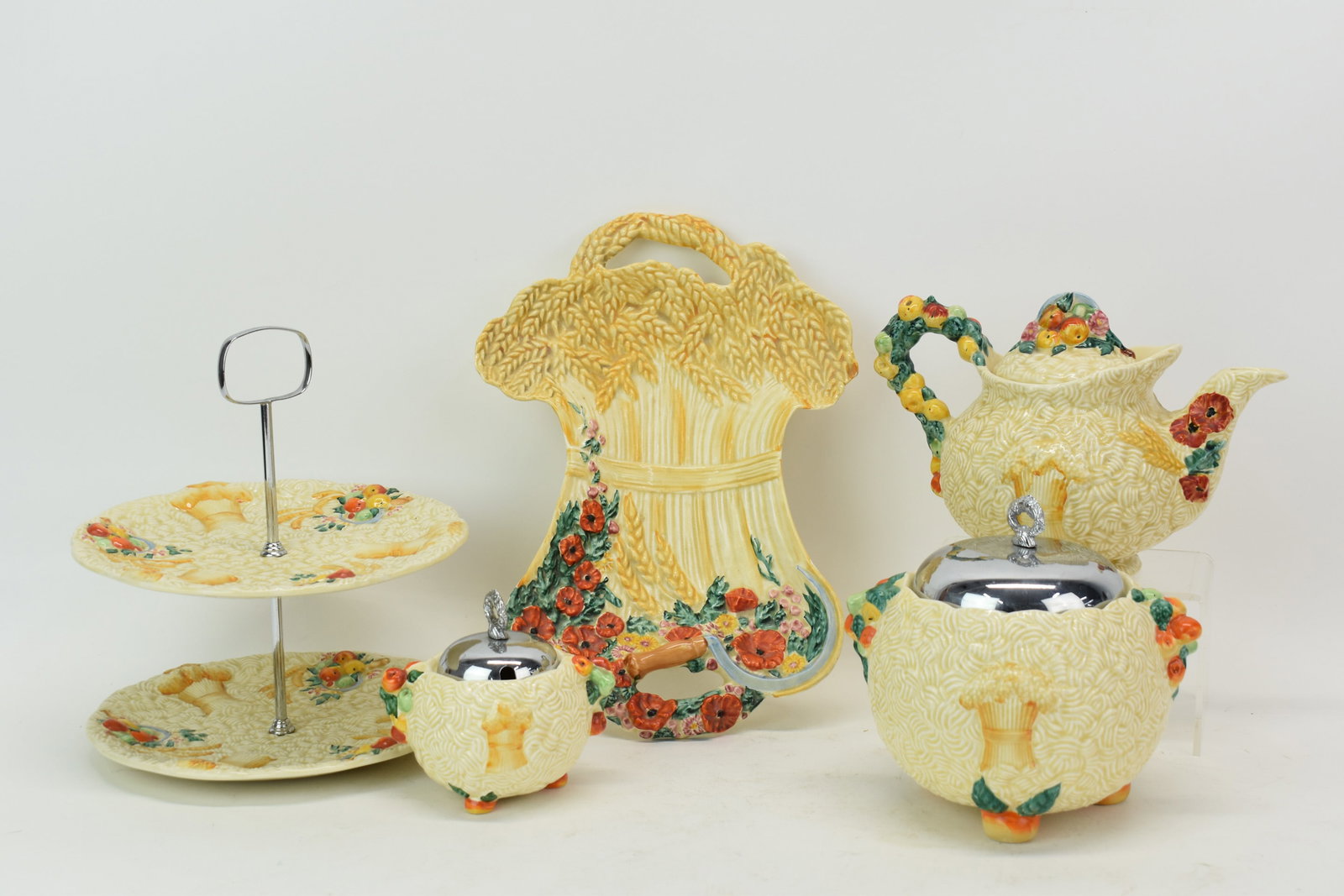 Five Clarence Cliff Celtic Harvest Serving Pieces: Five Clarence Cliff Celtic Harvest Serving Pieces Five Clarence Cliff Celtic Harvest Serving Pieces with green and black stamps. Comprising Serving Tray 13" x 9", Hot water pot, covered sugar, two tie