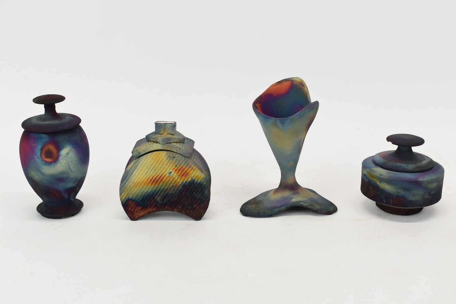 Pair of Stoneware Enamel Decorated Vases: Pair of Stoneware Enamel Decorated VasesPair of Stoneware Enamel Decorated Vases. Used condition. 10 1/4" tall x 3 3/4" dia