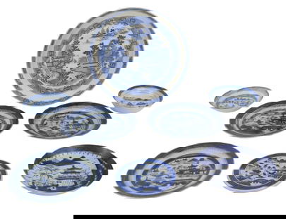 Eleven Chinese Blue Canton Porcelain Table Articles: Eleven Chinese Blue Canton Porcelain Table ArticlesIncluding, a platter, a footed platter, a punch bowl, a trivet, and dishes.Chips, wear, surface distress.Platter: 1 3/4 x 15 3/4 x 13 in. (4.4 x 40 x
