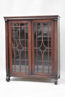 Mahogany Glass Front Bookcase Cabinet: Mahogany Glass Front Bookcase CabinetMahogany Glass Front Bookcase Cabinet, having sliding glass doors with wooden shelves. Used conditions, some wear, replaced back panel. 48 1/2" tall x 39 1/4" x 18