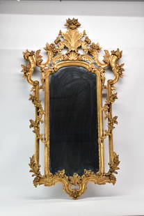Antique Rococo Style Parcel Gilt Hanging Wall Mirror: Antique Rococo Style Parcel Gilt Hanging Wall MirrorAntique Rococo Style Parcel Gilt Hanging Wall Mirror having allover floral foliate design. Paper label on verso reads Riccardo Cippoli Frenze. Used
