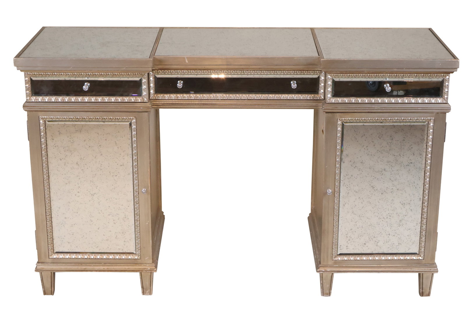 Neoclassical Style Silver-Gilt and Mirrored Vanity: Neoclassical Style Silver-Gilt and Mirrored Vanity 20th C. Left rear foot off but present, some surface distress and wear. 31 3/4 x 51 1/2 x 17 1/2 in. (80.6 x 130.8 x 44.5 cm.)