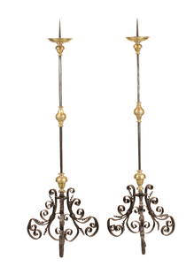 Pair of Baroque Brass and Iron Torcheres: Pair of Baroque Brass and Iron TorcheresItalian, 17th/18th C.Provenance: Paris, bought through decorator Robert Couturier71 x 19 in. (180.3 x 48.3 cm.)