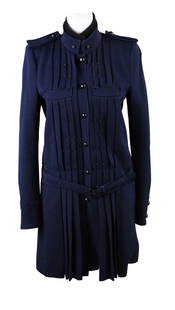 Balenciaga Navy Blue Pleated Coat: Balenciaga Navy Blue Pleated CoatSize 38, with attached belt.Lacking one button.Wear associated with use.Provenance: The Estate of Susan Chalom, New York, NY33 x 15 in. (83.8 x 38.1 cm.)