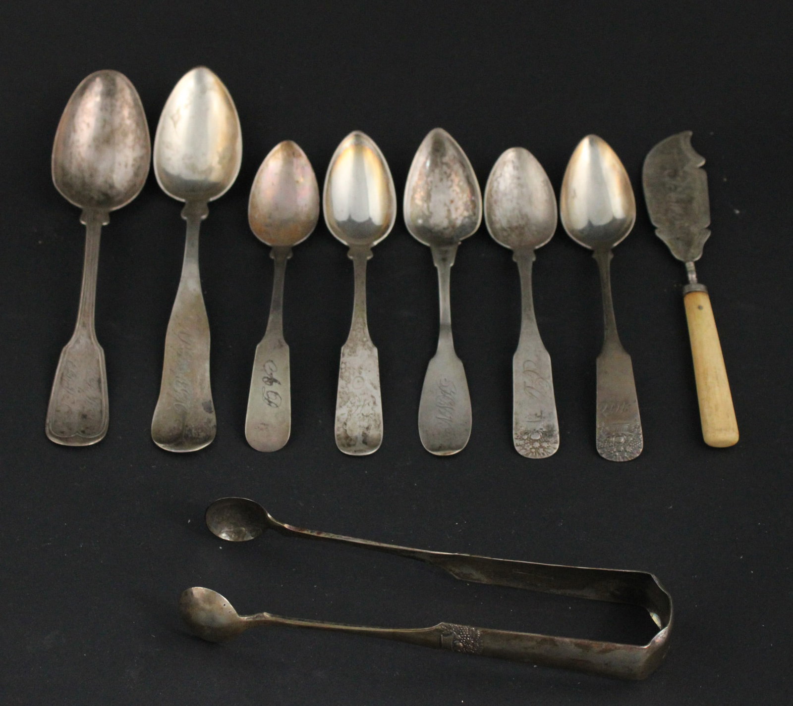 Rhode Island, MA, and CT Coin Silver Flatware: Rhode Island, MA, and CT Coin Silver FlatwareIncluding a Nichols coin silver and bone handled knife. Nichols, Rhode Island. Six E. Watson coin silver spoons and a pair of tongs. Edward Watson, Boston,