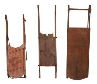 Three Children's Sleds