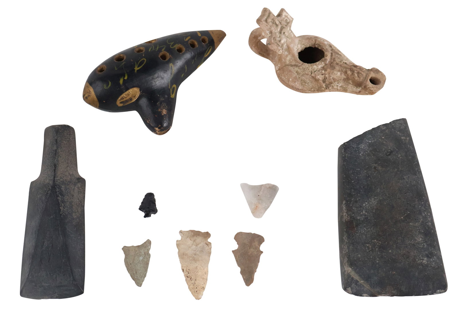 Two Guido Bondi Ocarinas: Two Guido Bondi OcarinasTogether with an earthenware oil lamp, stone tools and arrowheads.Provenance: Descended through the Herreshoff Family lineOcarina: 3 1/2 x 6 in. (8.9 x 15.2 cm.)