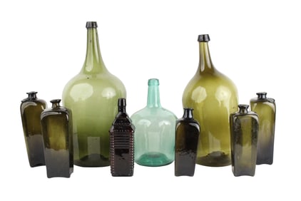 Nine Vintage Glass Jugs and Bottles