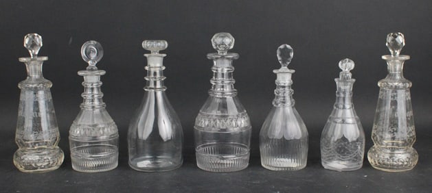 Five Colorless Glass Decanters