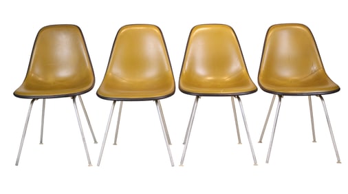 Four Herman Miller Green Leather Shell Chairs