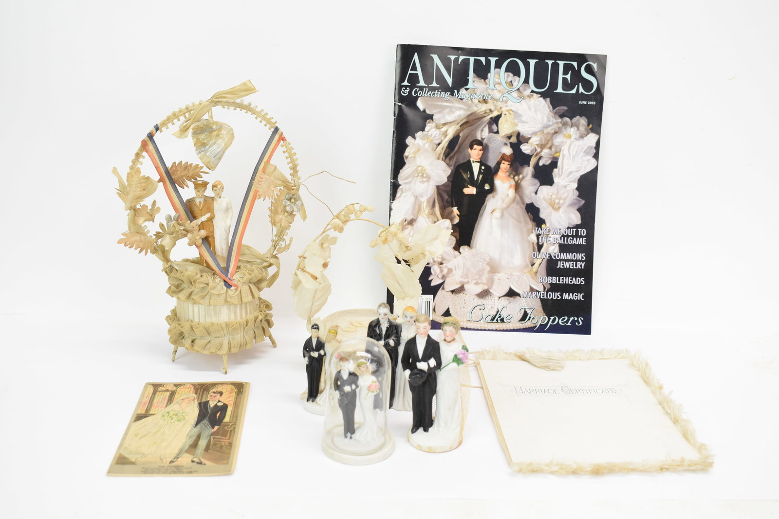 Vintage Group of Assorted Wedding Toppers: Vintage Group of Assorted Wedding Toppers Vintage Group of Assorted Wedding Toppers. Together with vintage post card titled "The Wedding", marriage certificate of Ada M. Vreeland and Nilson Kent dated