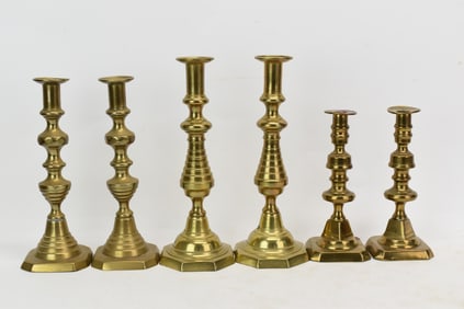Three Antique Pairs of Brass Push-Up Candlesticks