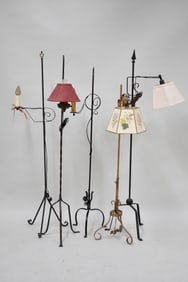 Four Assorted Wrought Iron Adjustable Floor Lamps