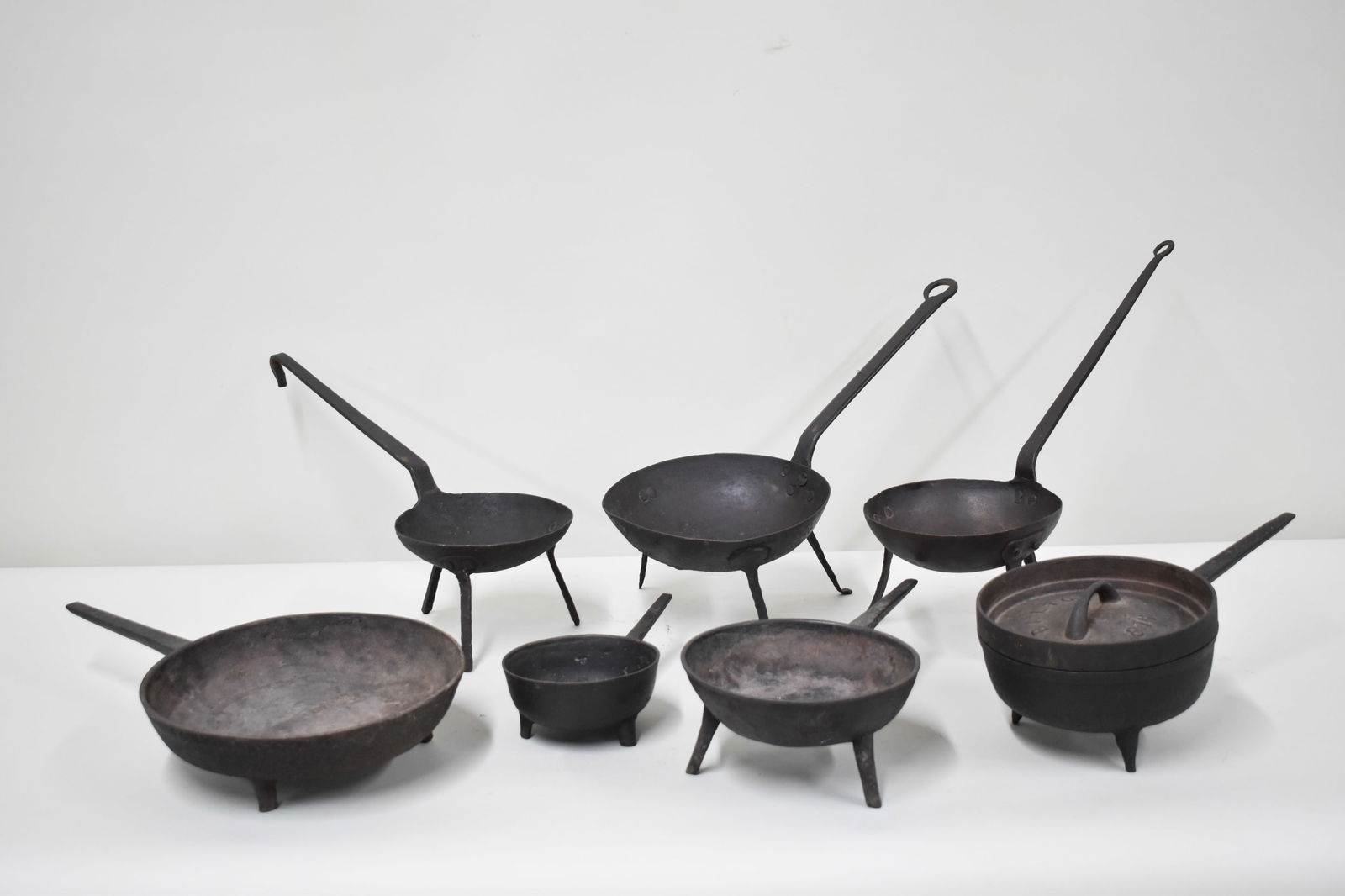 Seven Assorted Cast and Wrought Iron Spider Skillets (1 of 8)