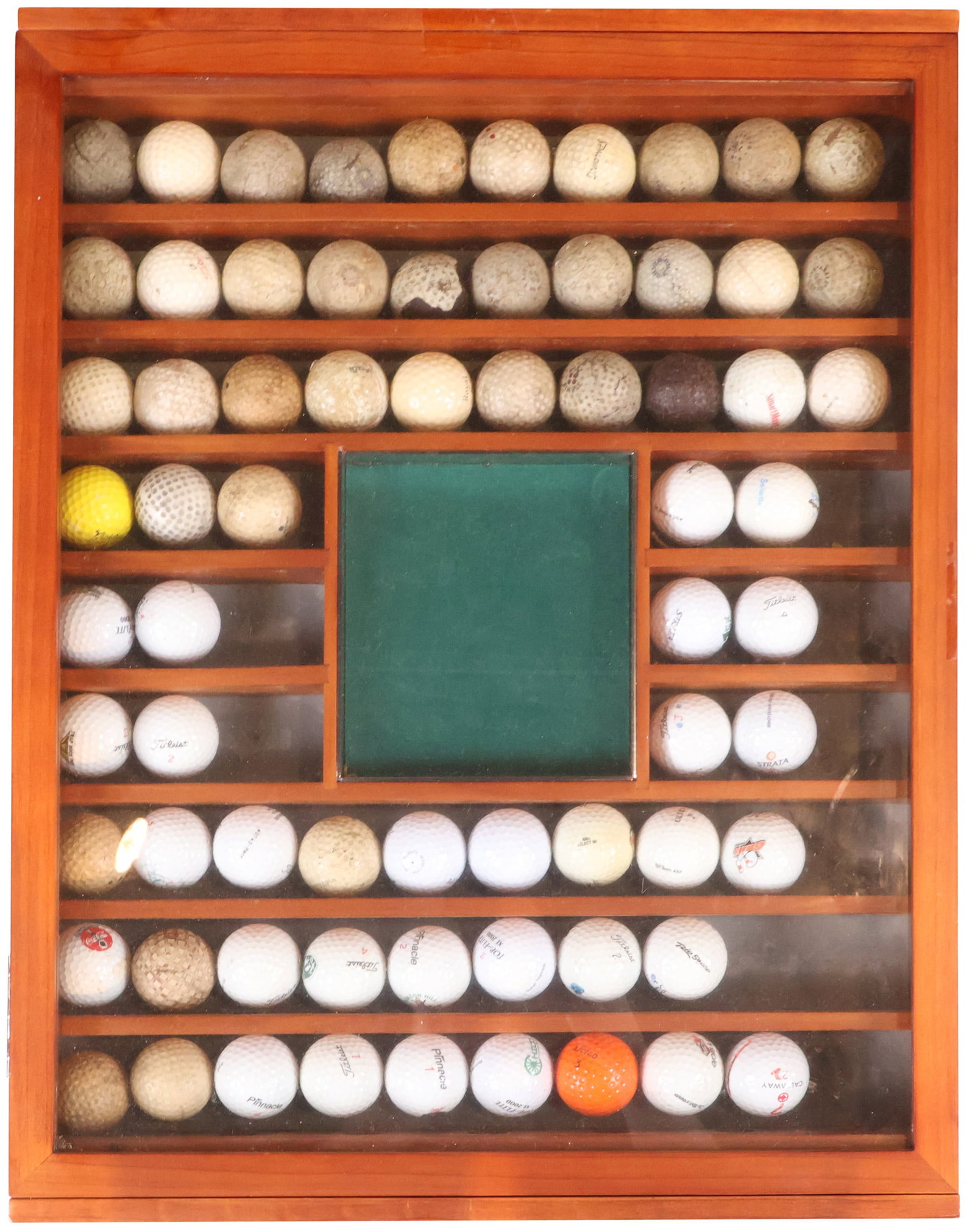 Cased Collection of Golf Balls: Cased Collection of Golf Balls Some golfballs are quite early. 23 1/4 x 17 7/8 x 3 in. (59.1 x 45.4 x 7.6 cm.)