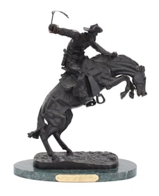 After Frederic Remington, American 1861-1909, Bronco Buster, Bronze