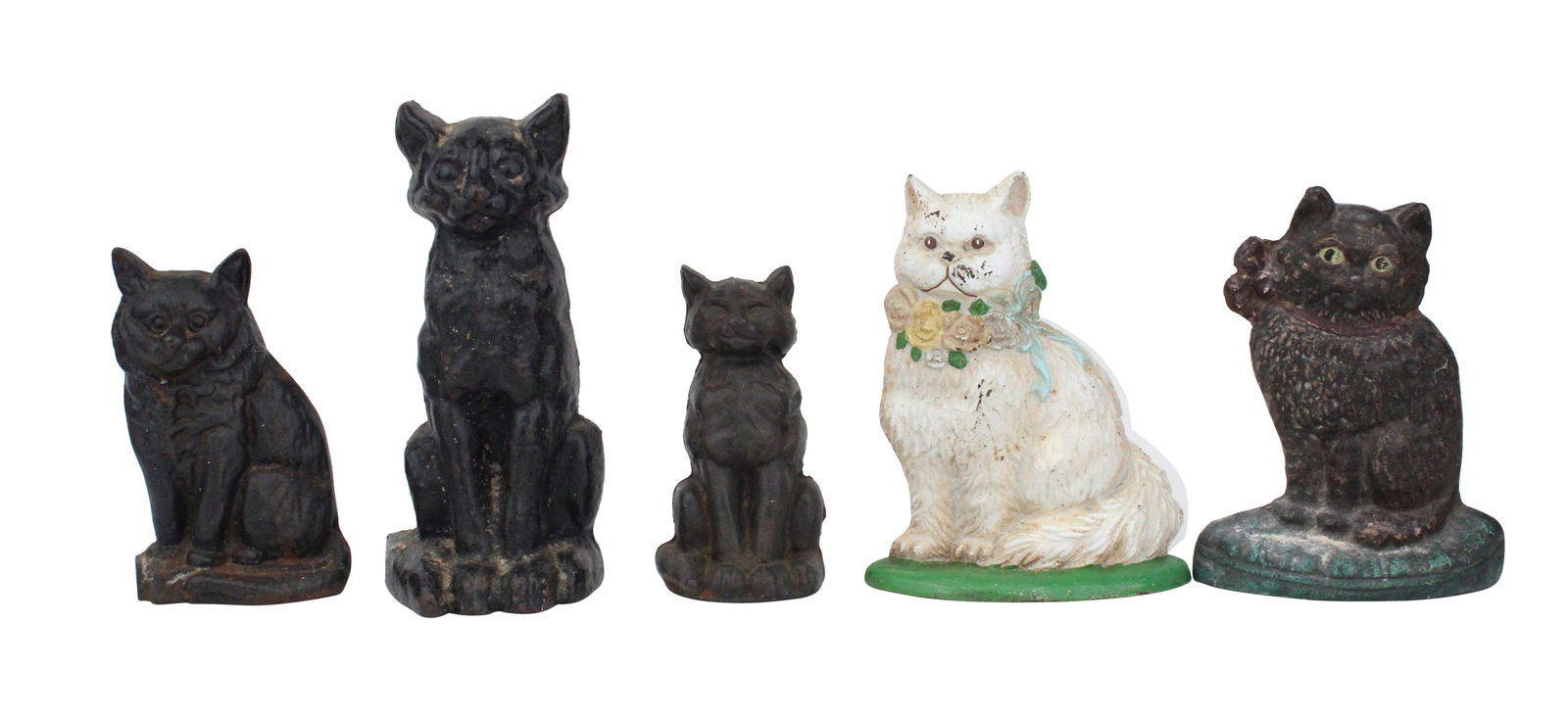 Five Cast-Iron Cat-Form Doorstops: Five Cast-Iron Cat-Form DoorstopsOne white painted, three black painted.Tallest: 9 3/4 x 4 1/2 x 3 1/2 in. (24.8 x 11.4 x 8.9 cm.)
