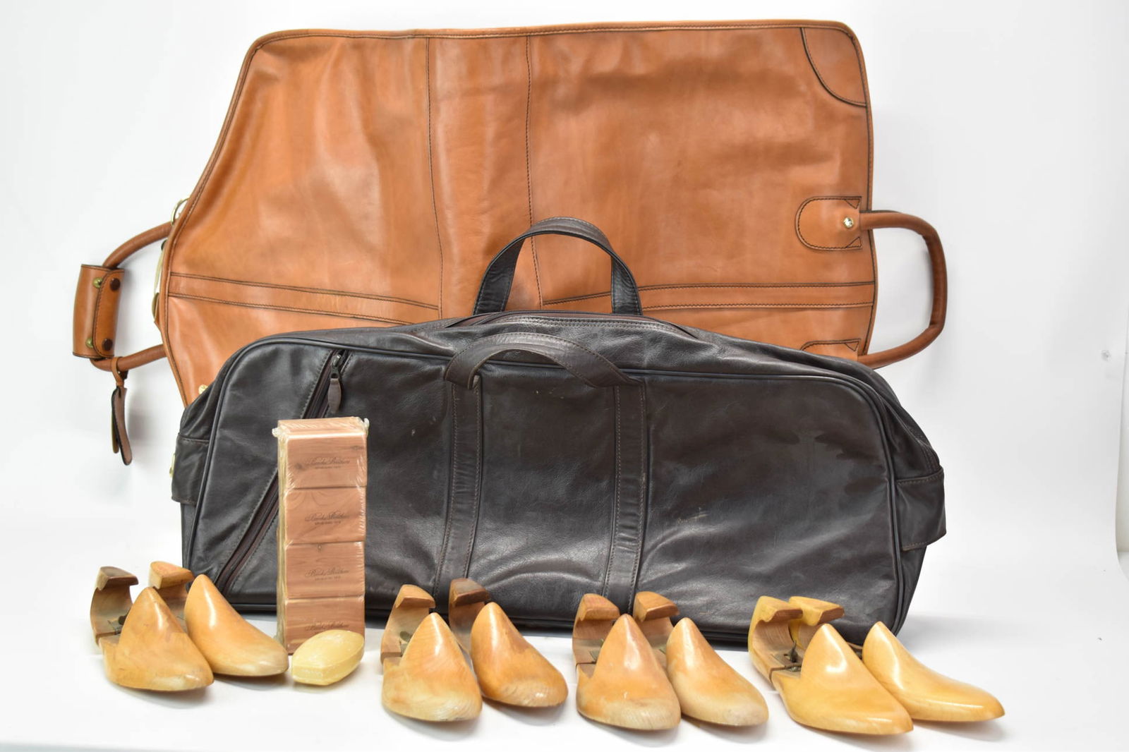 Vintage Saks Fifth Avenue Leather Garment Bag: Vintage Saks Fifth Avenue Leather Garment BagVintage Saks Fifth Avenue Leather Garment Bag together with Molmax leather bag, Brooks Brothers wooden shoe stretchers, cedar blocks and a bar of soap. Use