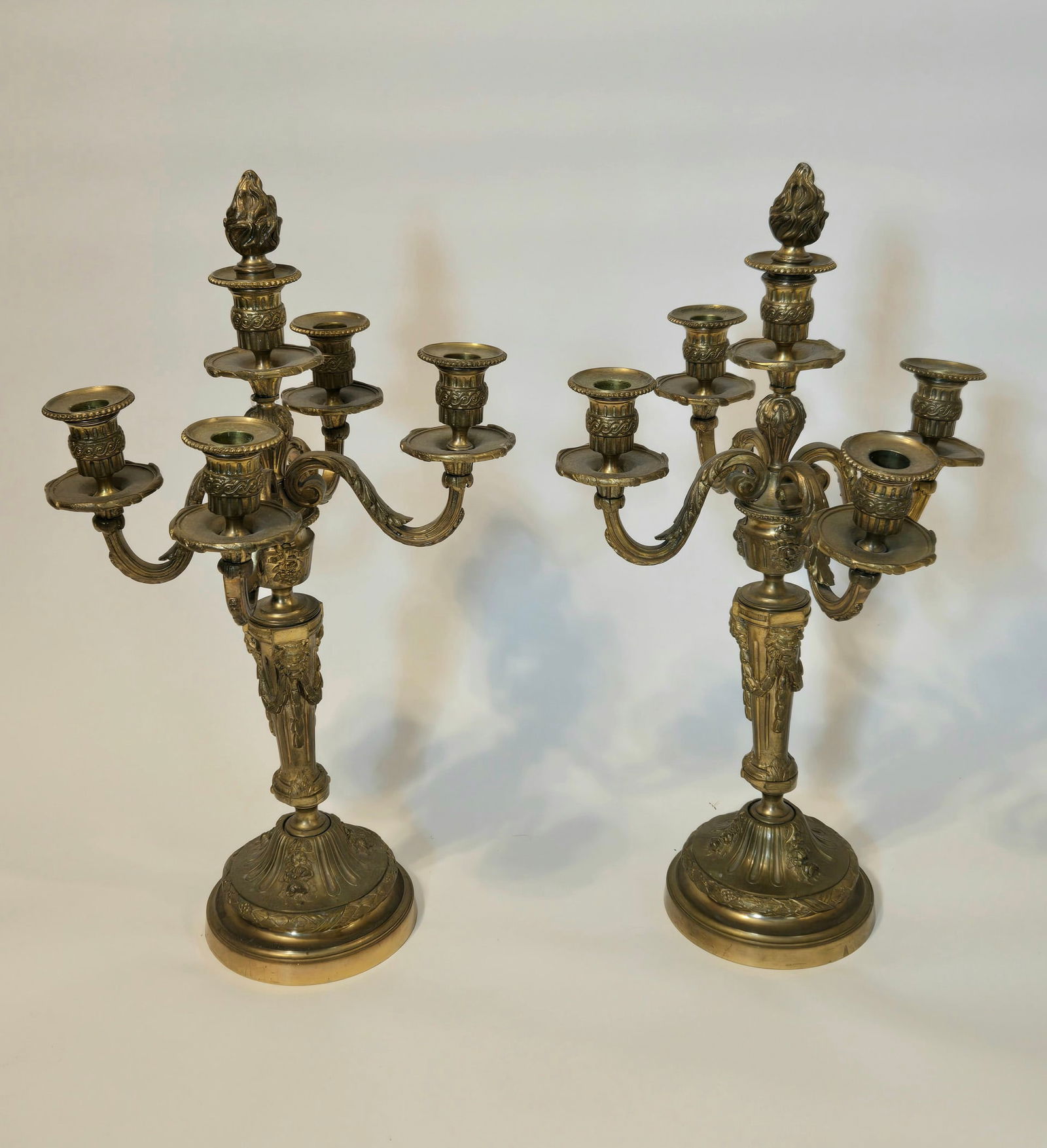 Pair of Golden Bronze Candelabras: Pair of Golden Bronze CandelabrasPair of Golden Bronze Candelabras in overall good condition.Heavy. Some typical wear. No missing pieces/bobeches'.20" x 13"