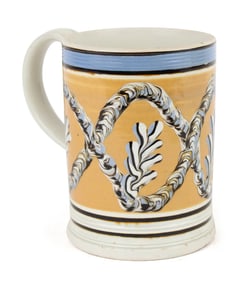 Polychrome and Elaborate Earthworm-Decorated Mochaware Mug
