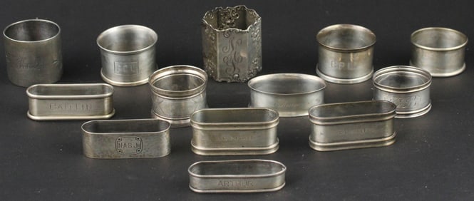 Thirteen Sterling and Silver Plated Napkin Rings
