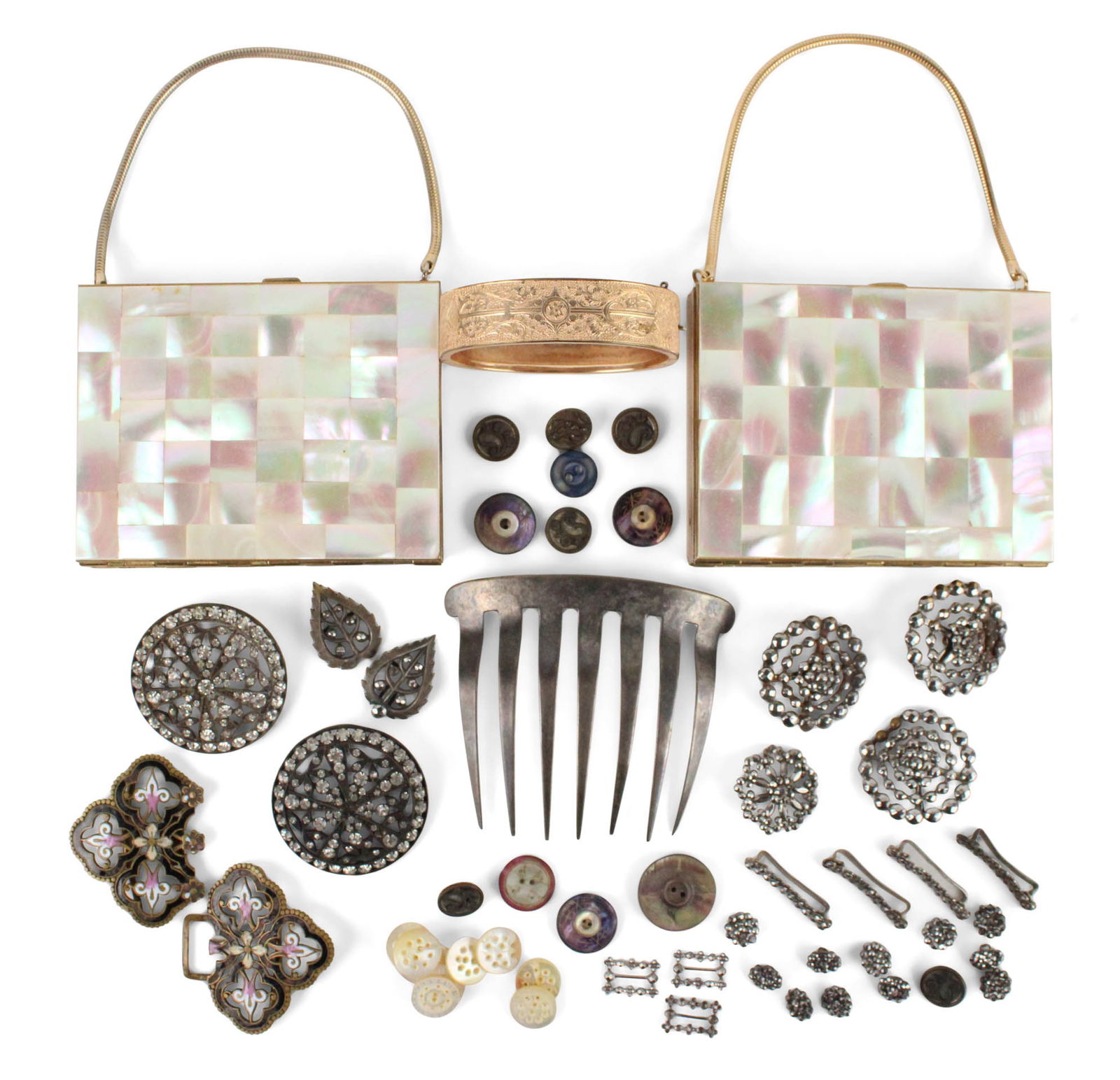 Group of Early Victorian Paste Buttons: Group of Early Victorian Paste ButtonsCut steel buttons, mother of pearl and Abalone buttons, along with two Victorian belt buckles (one enameled), a sterling hair comb, a gold filled ladies cuff brac