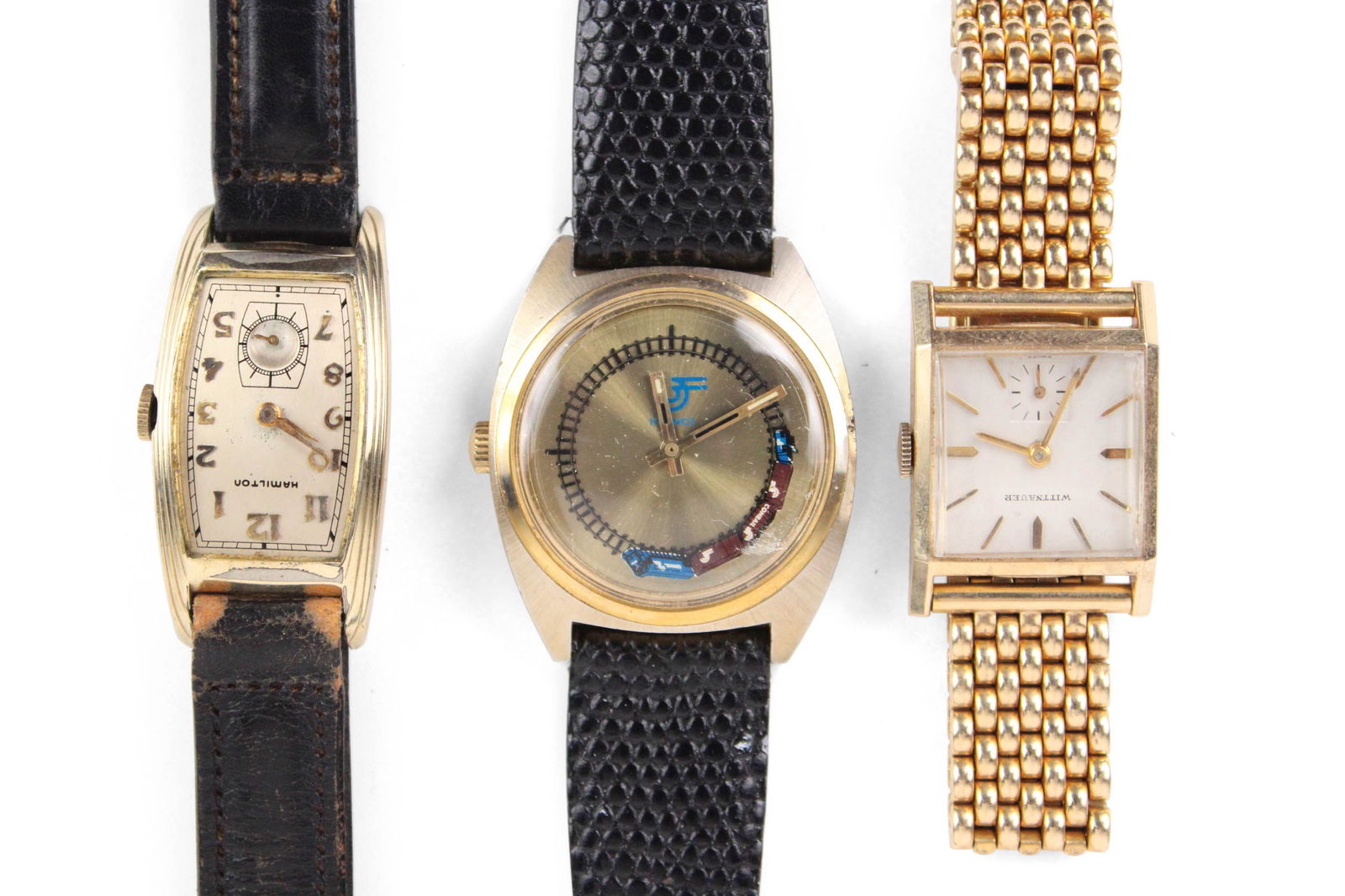 Rare Hamilton "Linwood" Wristwatch: Rare Hamilton "Linwood" WristwatchGold filled. Together with a Wittnauer gold filled square wristwatch on gold filled bracelet, and a "Conrail" novelty watch with running train to mark the seconds.