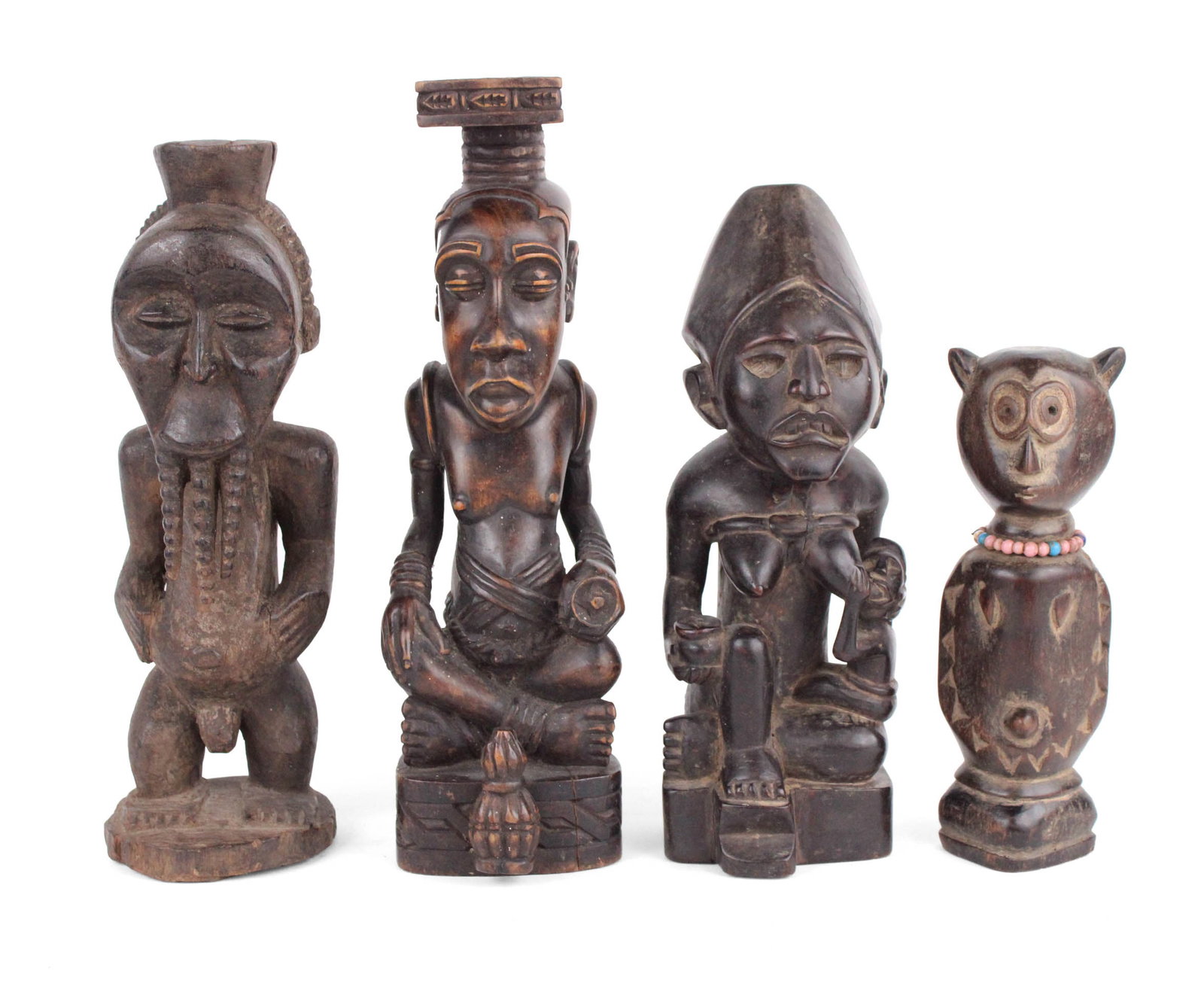 Four African Carved Hardwood Statues (1 of 7)