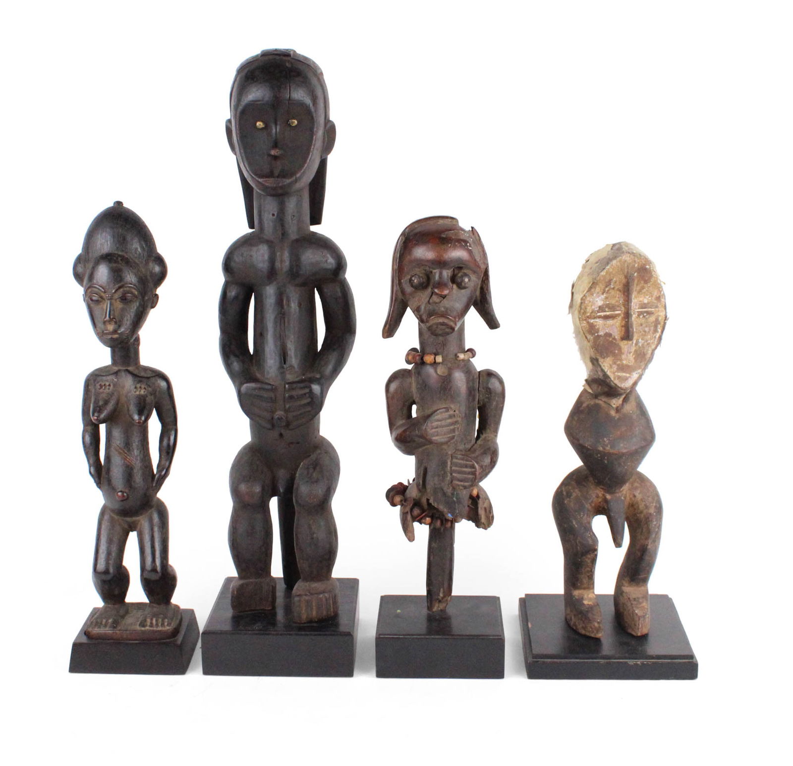 Four African Carved Wood Figures (1 of 10)