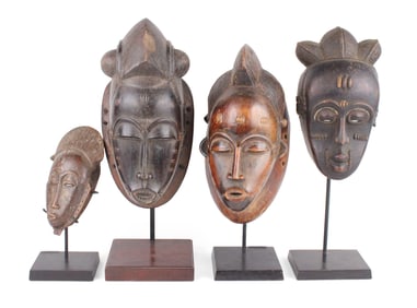 Four African Carved Wood Tribal Masks