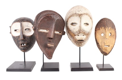 Four African Carved Wood Tribal Masks