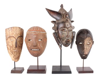 Four African Carved Wood Tribal Masks