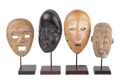 Four African Carved Wood Tribal Masks