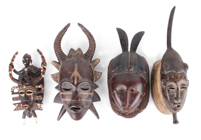 Four African Carved Wood Horned Tribal Masks