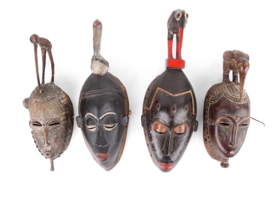 Four African Carved Wood Tribal Masks