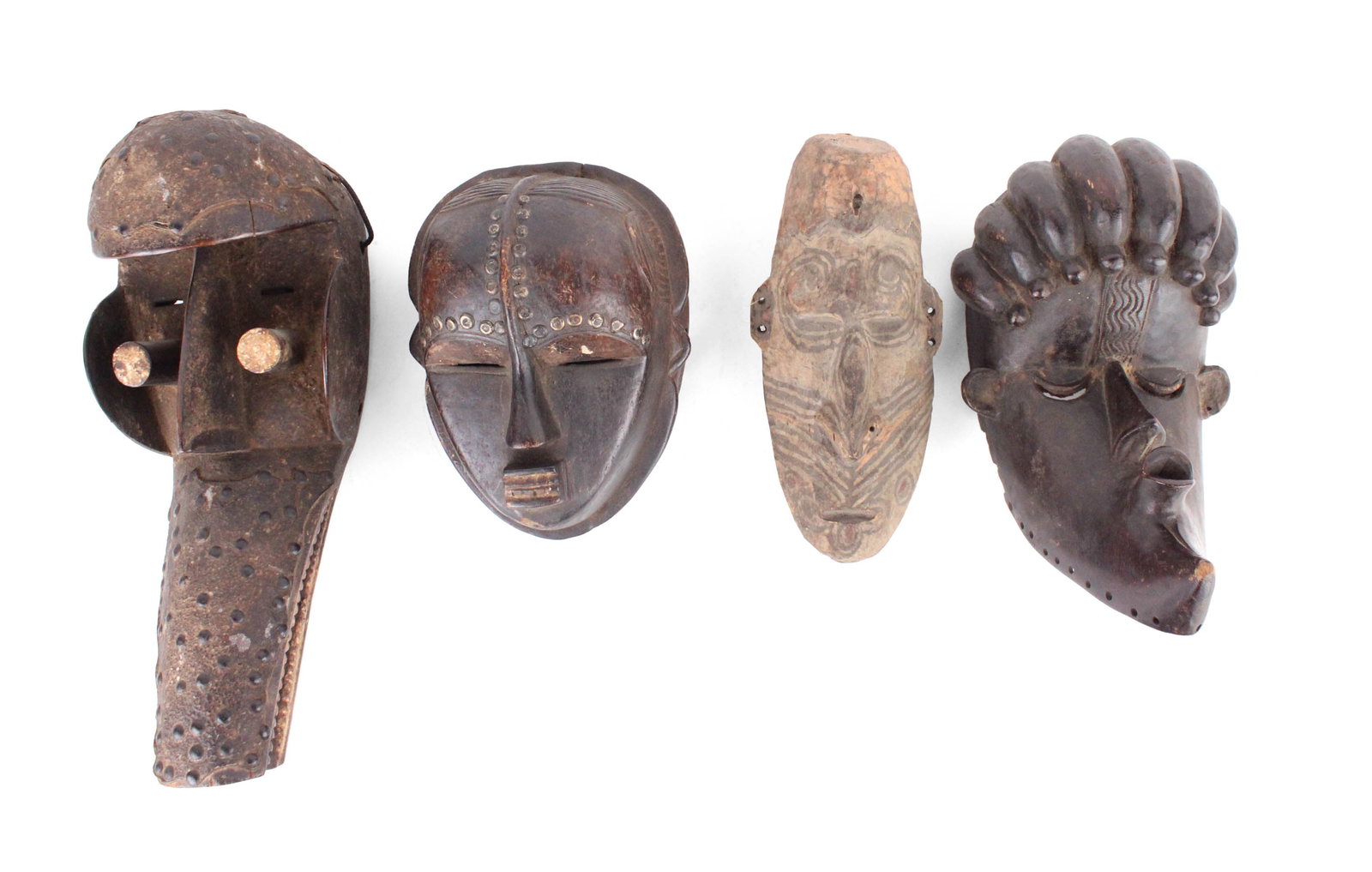 Three African Carved Wood Tribal Masks (1 of 12)