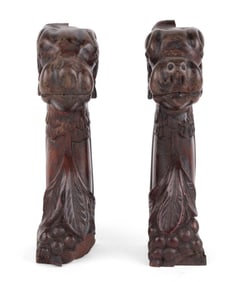 Pair of Carved Mahogany Dog's Head Supports
