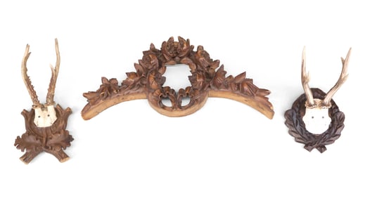 Two Roebuck Antlers on Carved Back Plates