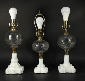 Three White and Colorless Pressed Glass Fluid Lamps