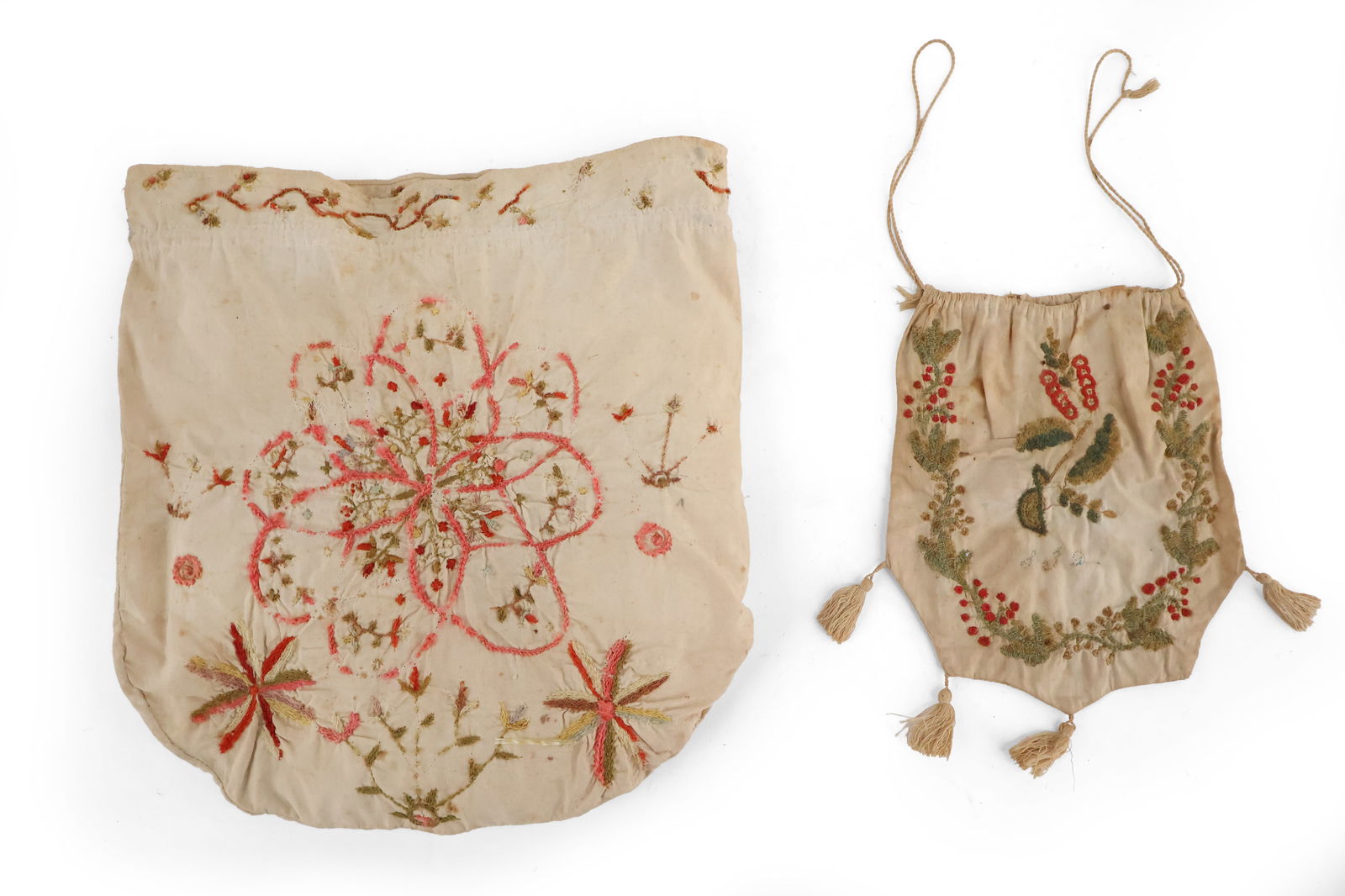 Two Cloth and Needlework Pockets: Two Cloth and Needlework PocketsAmerican, 19th C. Provenance: (Larger)Stephen Score, Boston, Massachusetts.8 1/2 x 6 1/4 in. (21.6 x 15.9 cm.), Frame: 11 1/2 x 11 in. (29.2 x 27.9 cm.)