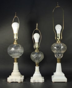 Three Colorless and White Pressed Glass Fluid Lamps