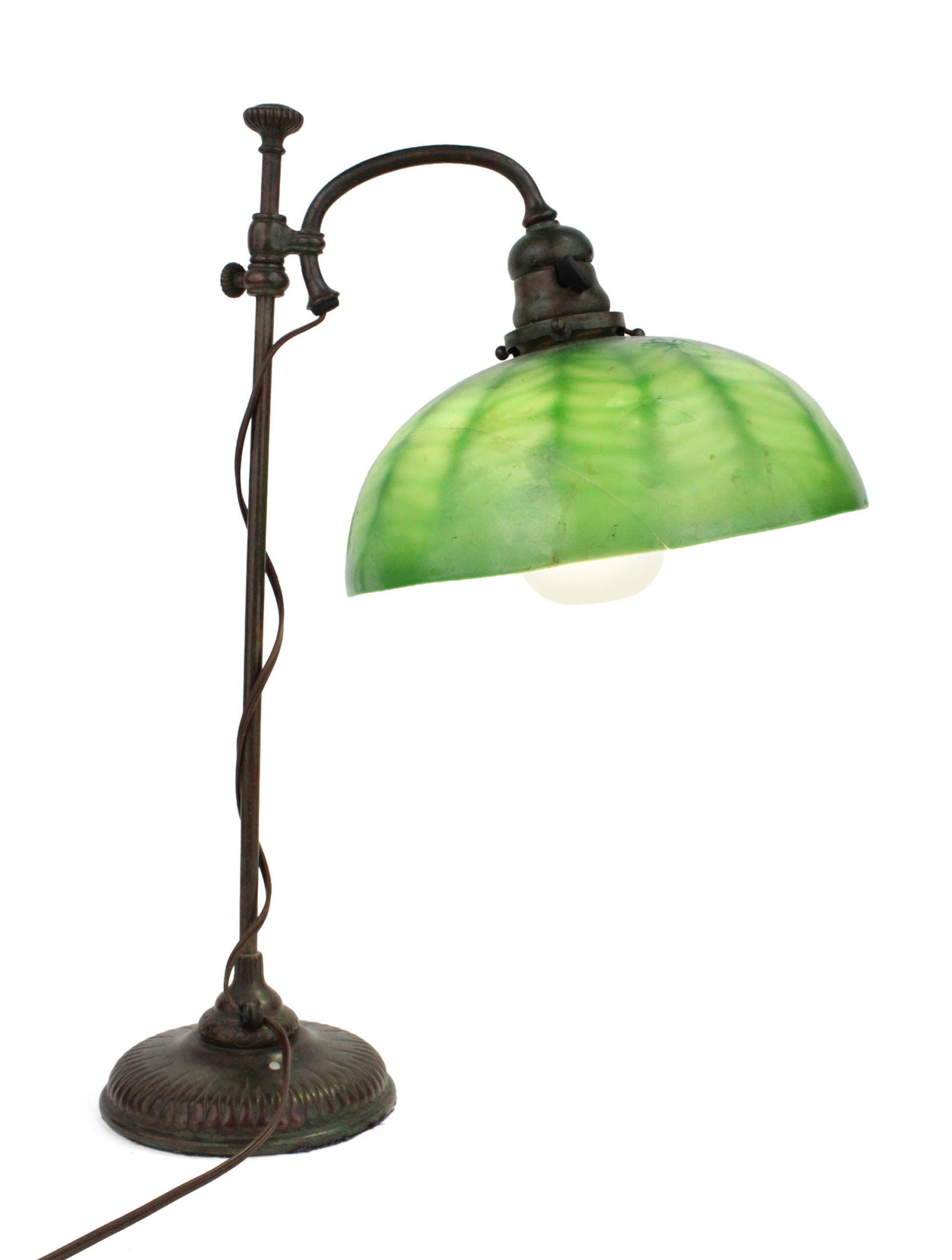 Tiffany Studios Cast Bronze Desk Lamp: Tiffany Studios Cast Bronze Desk LampShade cracked and repaired.19 3/4 x 10 in. (50.2 x 25.4 cm.)