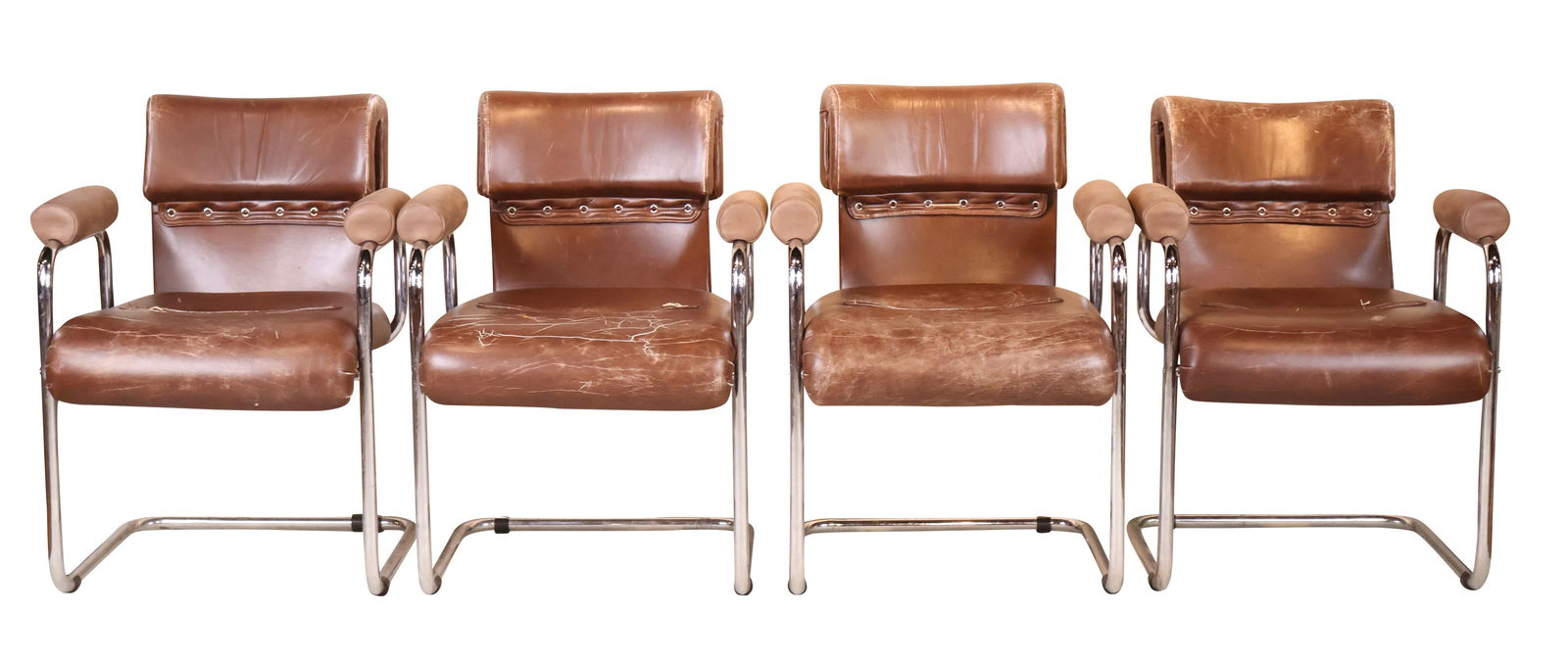 Four Guido Faleschini Chairs by Marini: Four Guido Faleschini Chairs by MariniBrown leather and chrome.Cracks to leather, wear, losses.31 1/4 x 23 1/2 x 26 in. (79.4 x 59.7 x 66 cm.)
