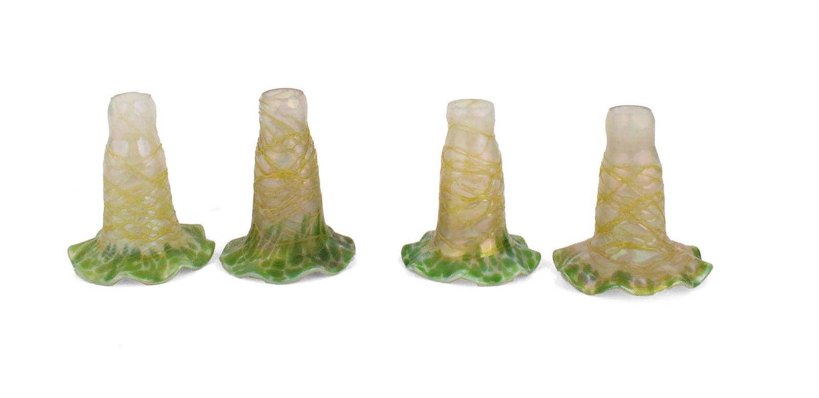 Four Favrile Glass Lily Shades: Four Favrile Glass Lily ShadesUnmarked, in the Tiffany Style.4 1/2 x 3 1/2 in. (11.4 x 8.9 cm.)