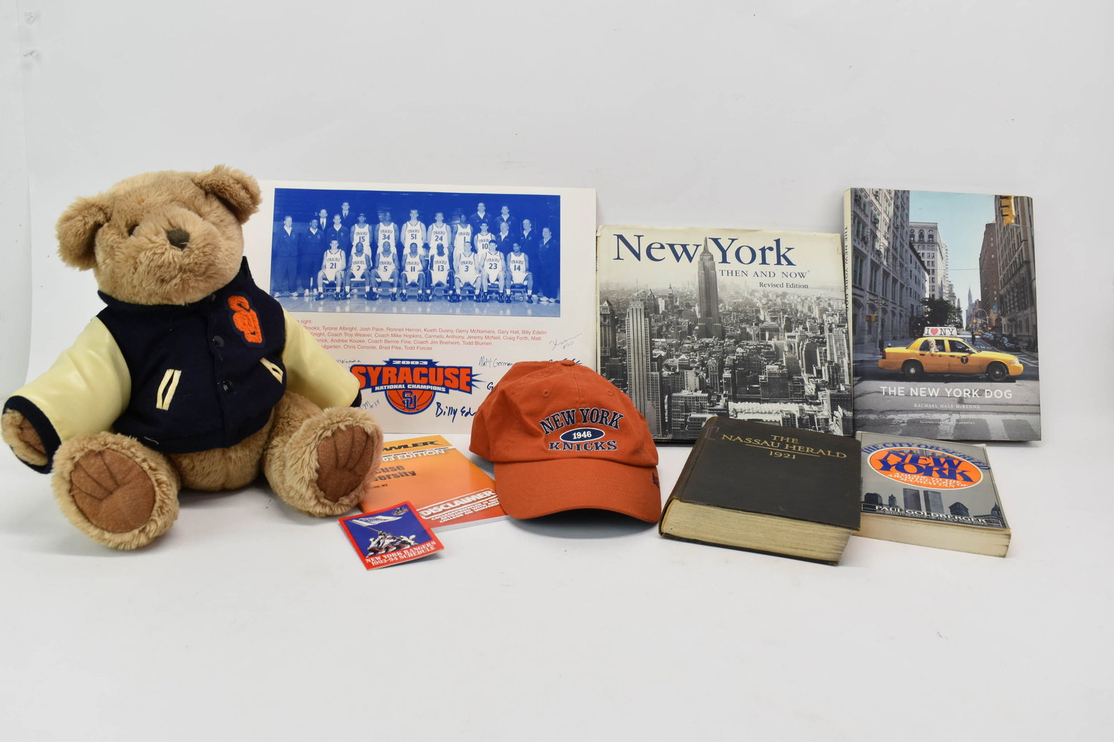 Group of Assorted New York Books and Collectables: Group of Assorted New York Books and Collectables Group of Assorted New York Books and Collectables. Comprising Syracuse University Bear, Syracuse 2003 National Champions Commemorative team photo and