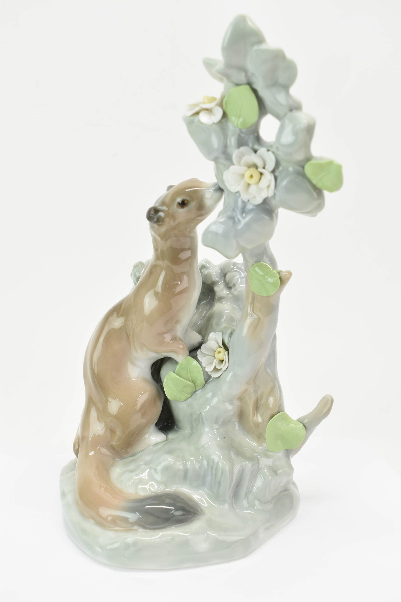 Vintage Lladro Porcelain Ermine: Vintage Lladro Porcelain Ermine Vintage Lladro Porcelain Ermine in Floral Tree. Used condition, missing flower, 9" tall x 4 3/4" x 5"
