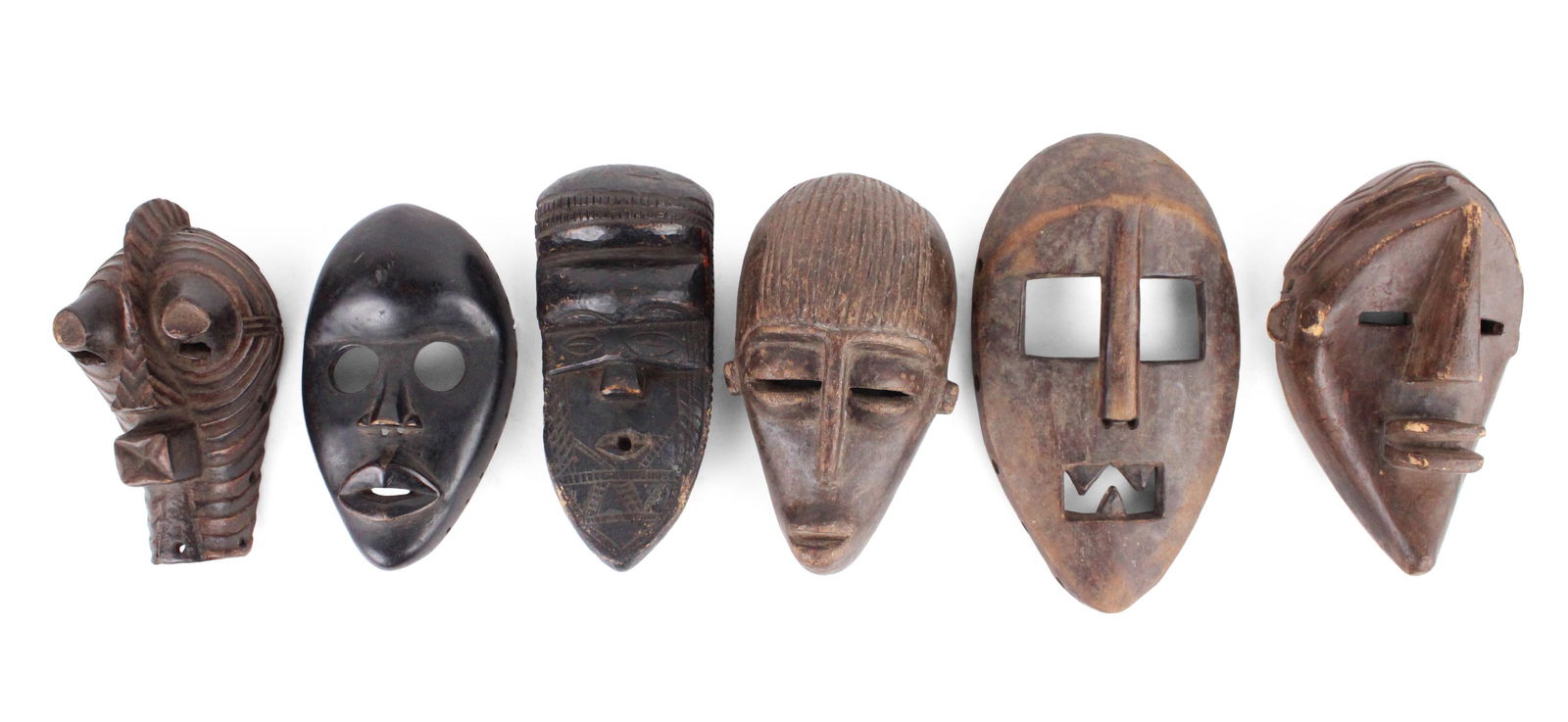 Six African Carved Wood Tribal Masks (1 of 13)